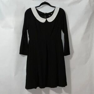 Black dress with white collar